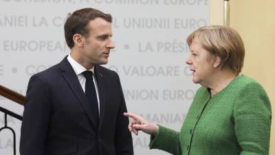 Merkel admitiu ter uma “relação conflituosa” com Presidente francês